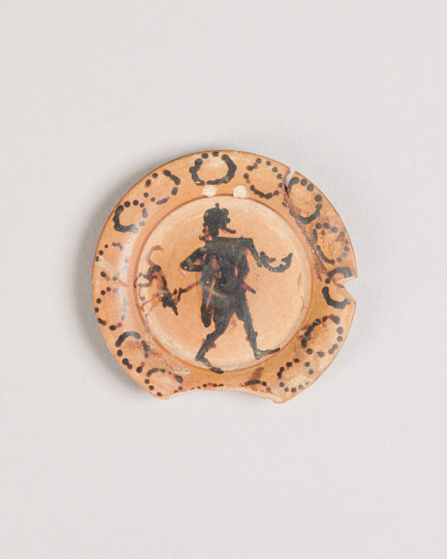 Black Figure Plate Depicting Hermes Walking His Dog (Child's Toy)