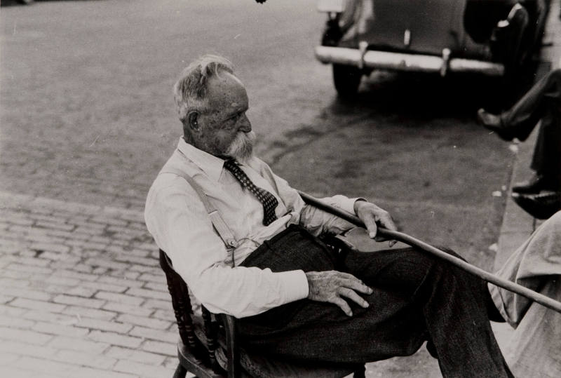 "Kentucky Colonel" Sitting in Street in Front of Courthouse, Versailles, Kentucky