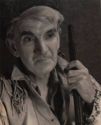 Portrait of a man with a gun, possibly Alexis Kosloff