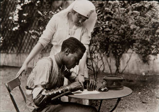 Red Cross Nurse with Patient